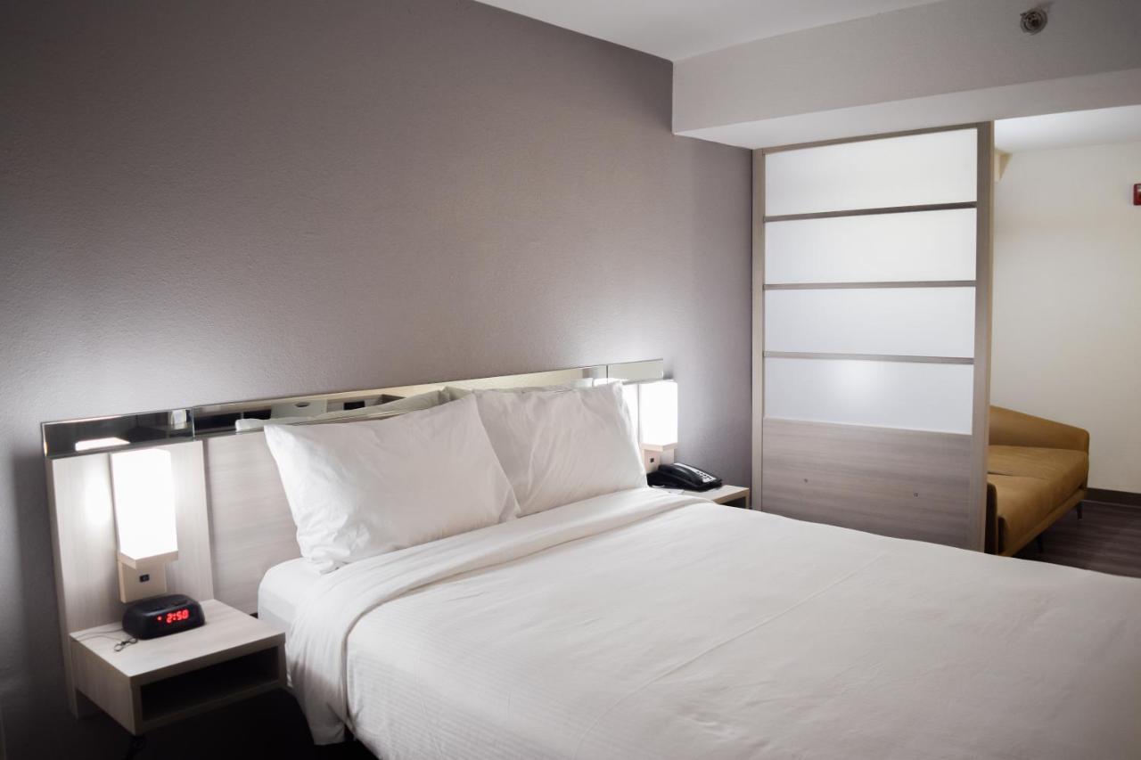 Travelers Inn And Suites Raleigh Esterno foto
